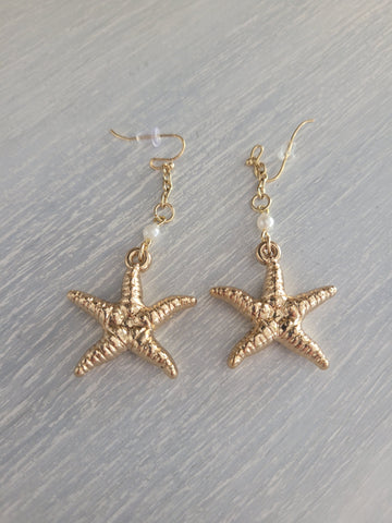 Starfish gold color earrings
