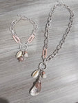 Necklace with shell and stone charm