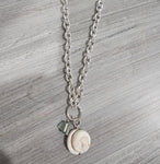 Necklace with shell and stone charm