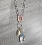 Necklace with shell and stone charm