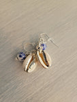 Silver and ivory seashell dangling earrings with white and blue flower bead