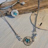 Stainless steel set of necklace and bangle bracelet with sea turtle charms.