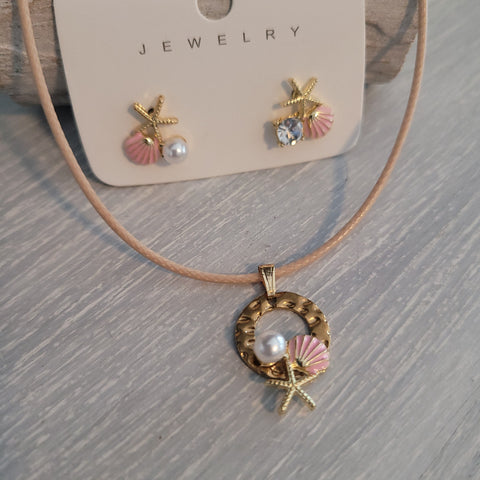 Cord necklace and earring set with pink seashell, starfish, and clear rhinestone