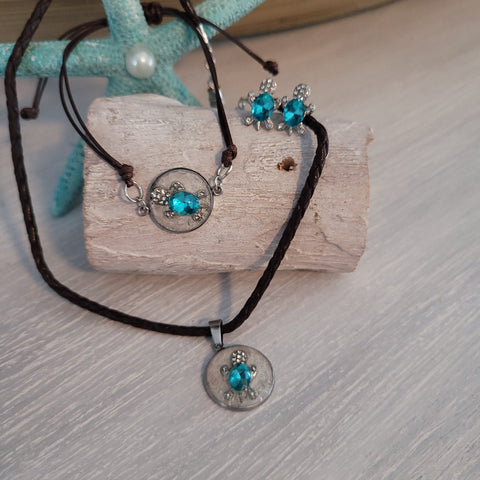 Brown, cord necklace and bracelet set with sea turtle charm.