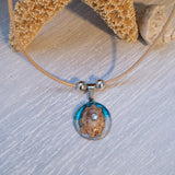 Double cord necklace with real seashell.