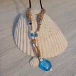 Brown cord necklace with real seashell