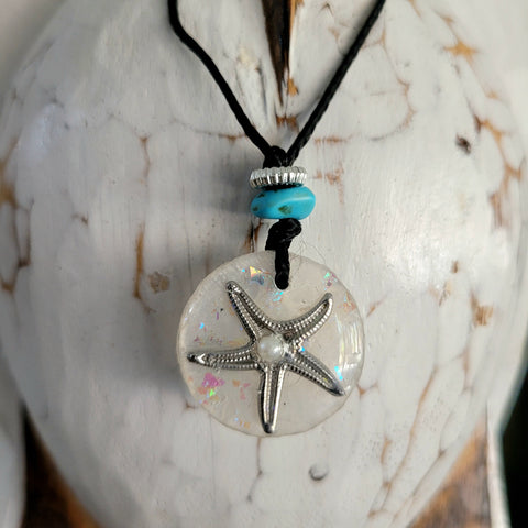 Cord starfish in a shell necklace